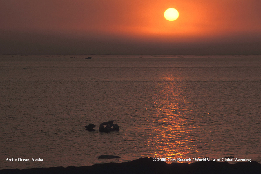 Midnight sun across ice free Arctic Ocean, Barrow Alaska. The Northwest Passage is becoming ice free in late summers.