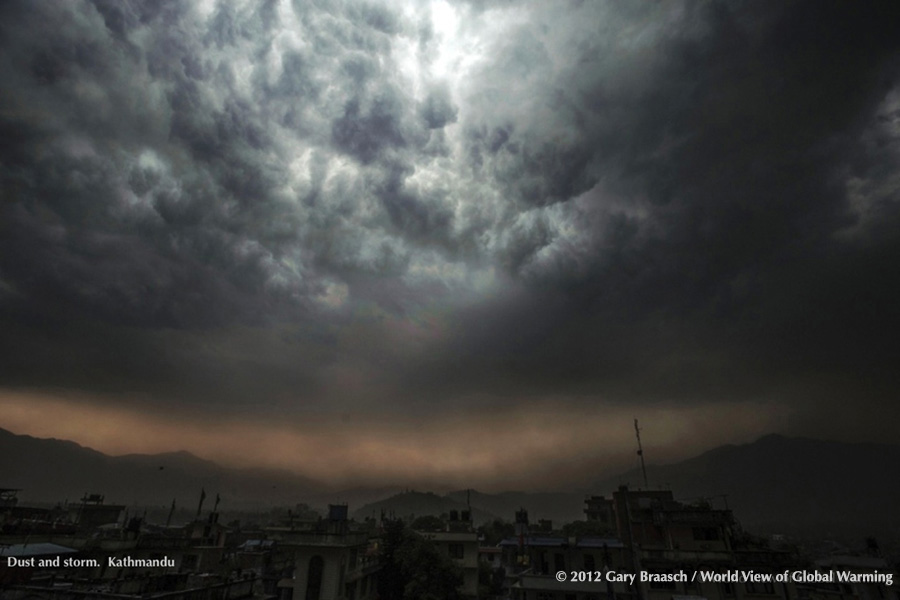 Strong thunderstorm stirs thick dust from streets of Kathmandu, Nepal.