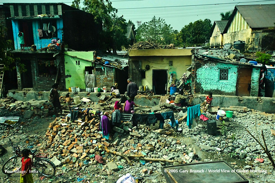 Cities Communities climate India poor villagers between coal plant & rail tracks near Delhi