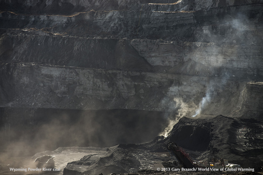 Eagle Butte coal mine, Gillette Wyoming, dwarfs a 20 foot high coal truck. Amost half US coal is mined in Powder River Basin of Wyoming and Montana & burned for 37 percent of U.S. electricity.