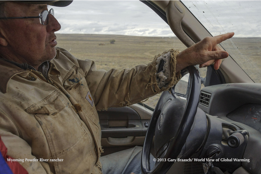 Rancher L J Turner points out land and water lost by growing coal mines near his ranch in the Powder River Basin, Wyoming