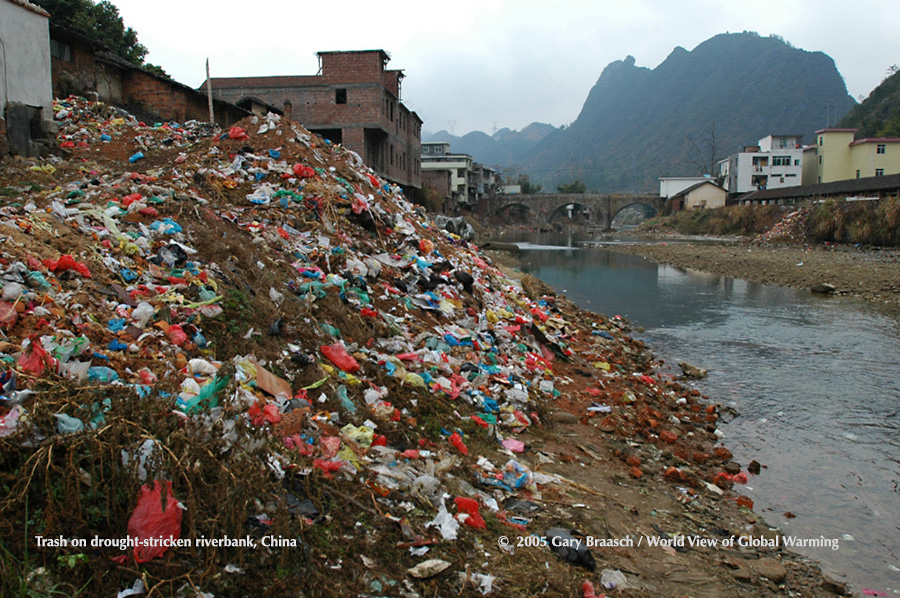 Drought reveals trash dumped in river before water levels fell to record low, Daquo village, Guangdong China. (See Asia)