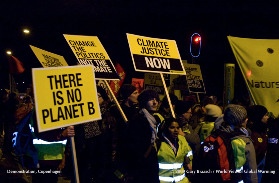 Demonstrators in a night march urge action during the COP 15 climate meetings in Copenhagen.