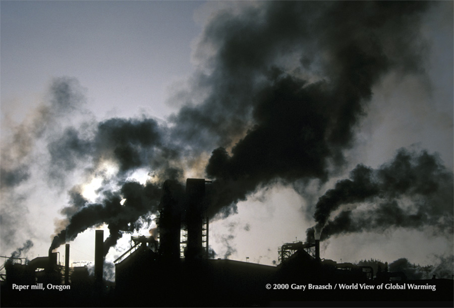 Heat and fumes from paper mill, an indication of emissions from factories and power generation using fossil fuel. This mill is in Prince Rupert BC Canada. 