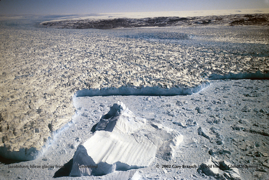 Terminus, calving zone, of Jacobshavn Glacier, West Greenland, one of the world's fastest moving glaciers. From NASA glacier survery aircraft.