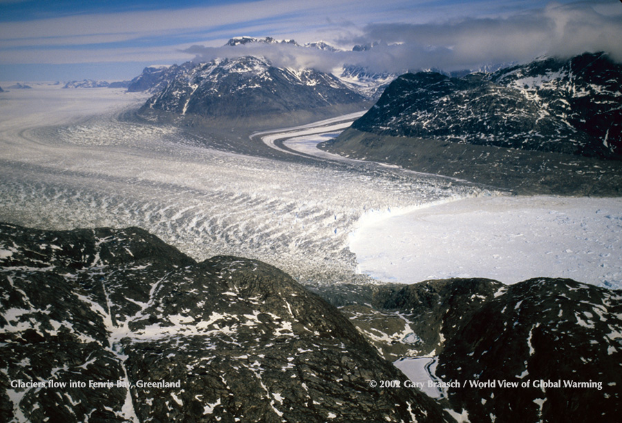 Glacier on east coast of Greenland, entering Fenris Bay, with evidence from trim line and crevasses of thinning and increased speed.
