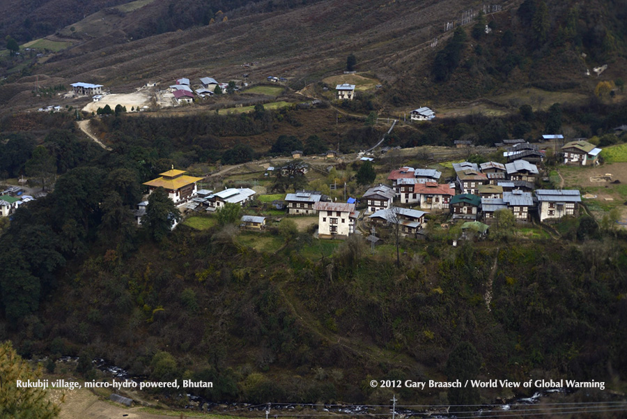 Rukubji, an ancient village in Bhutan, powered by micro-hydro from small stream in foreground.s.