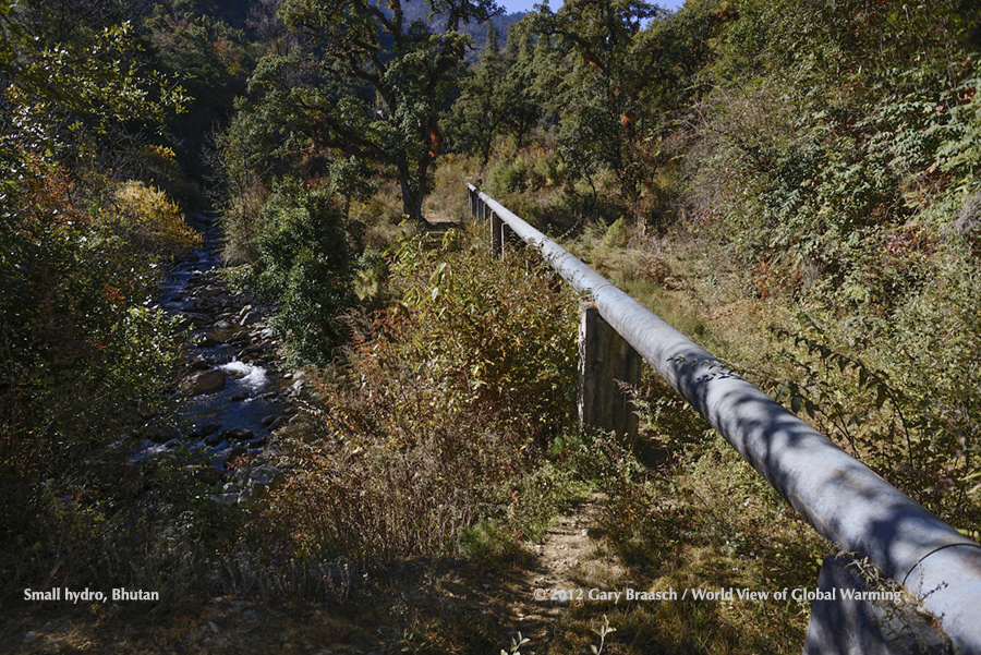 Water pipe to turbine along stream in Chendebji, Bhutan, a village powered by micro-hydro, an early UN climate convention CDM project. 