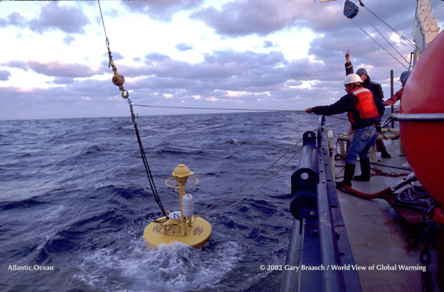 Technicians on the RV Oceanus, Woods Hold Oceanographic institution, recover bouy of a deep ocean array of instruments studying the Gulf Stream off NYC.