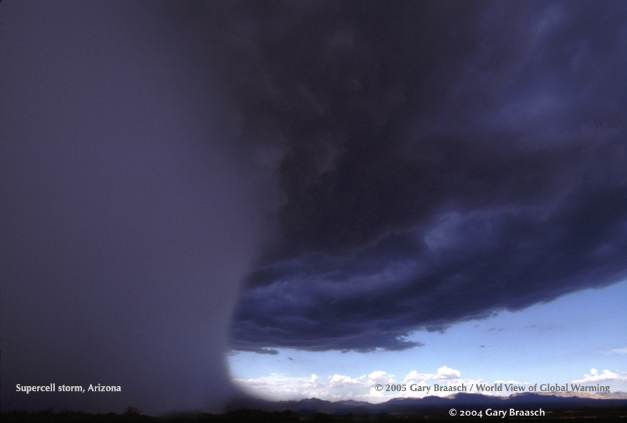 Downpour of torrential rain from a thunderstorm super cell draws a curtain across the San Pedro River valley, Arizona.