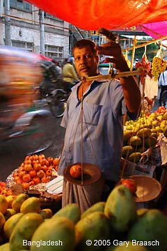 Fruit vendor near Sadarghat, the main docks of Dhaka, Bangladesh